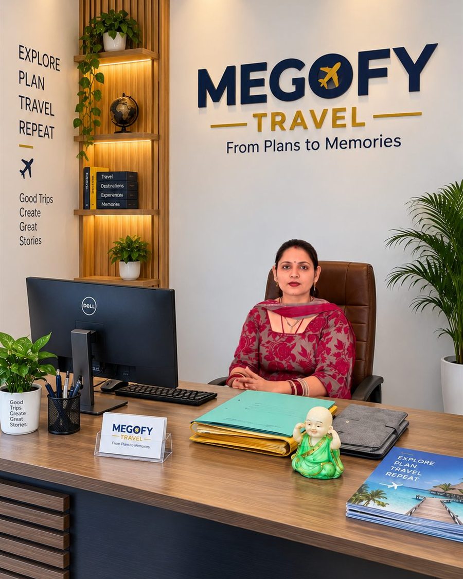 The owner of Megofy Travel at her desk in the Santokhgarh office